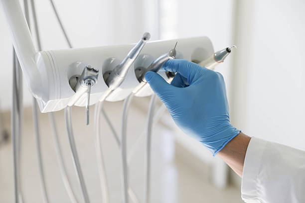 Professional Tooth Extraction technician working in Wilsonville, AL